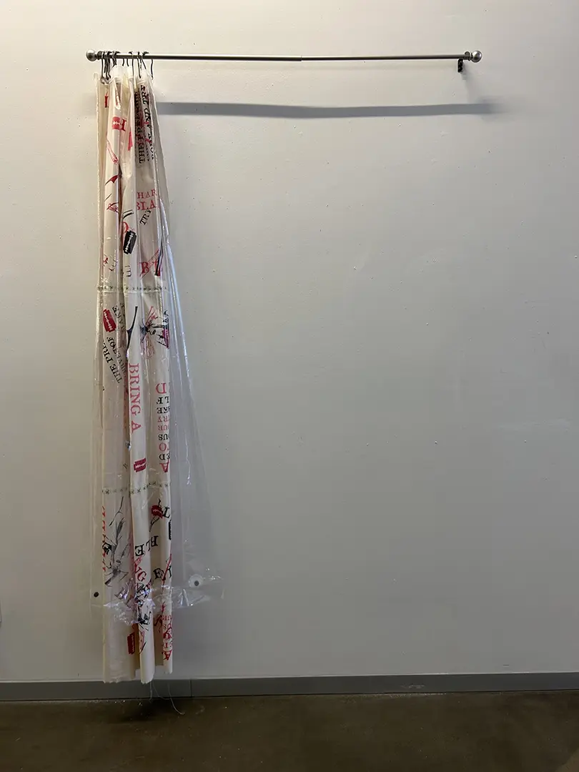 The curtain pulled to one side as if open.